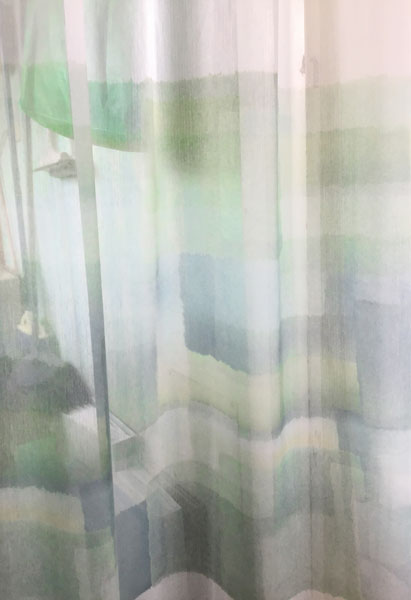 裾
